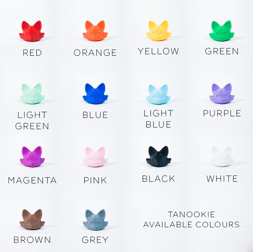A grid of cat-shaped color options labeled with names such as RED, ORANGE, YELLOW, GREEN, LIGHT GREEN, BLUE, LIGHT BLUE, PURPLE, MAGENTA, PINK, BLACK, WHITE, BROWN, and GREY. Text at the bottom reads 'TANOOKIE AVAILABLE COLOURS.